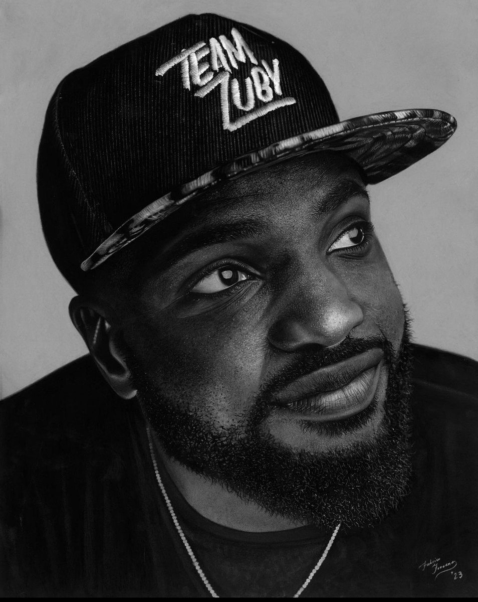This is the CRAZIEST picture anyone has ever drawn of me. By hand with charcoal. It took him 62 hours. I'm humbled every time I look at it. Shout out to fabricetheartist on Instagram. Incredible talent!