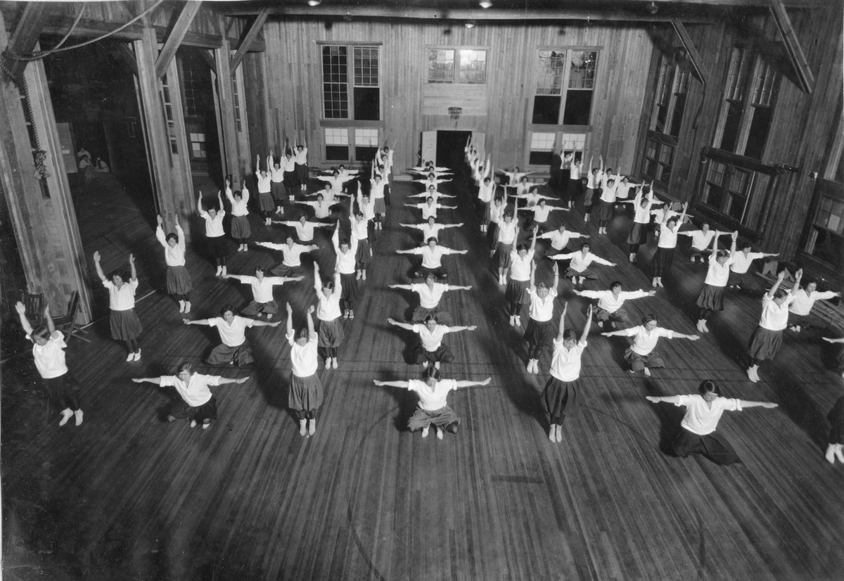 1924: @UTAustin women students do calisthenics in a P.E. class a century ago. The women's gym was a temporary pinewood structure about where the Texas Union stands today, and was also the scene of all-University dances before Gregory Gym and the Union arrived in the 1930s.