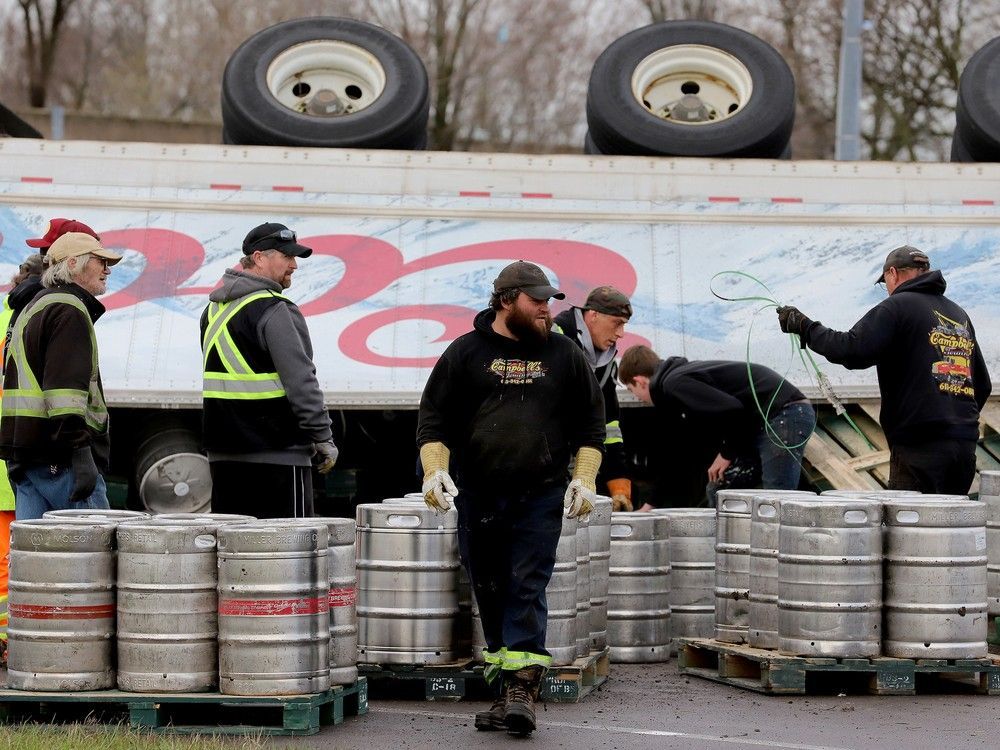Driver charged after load of beer kegs tumbles off truck in Brockville crash ottawacitizen.com/news/local-new…