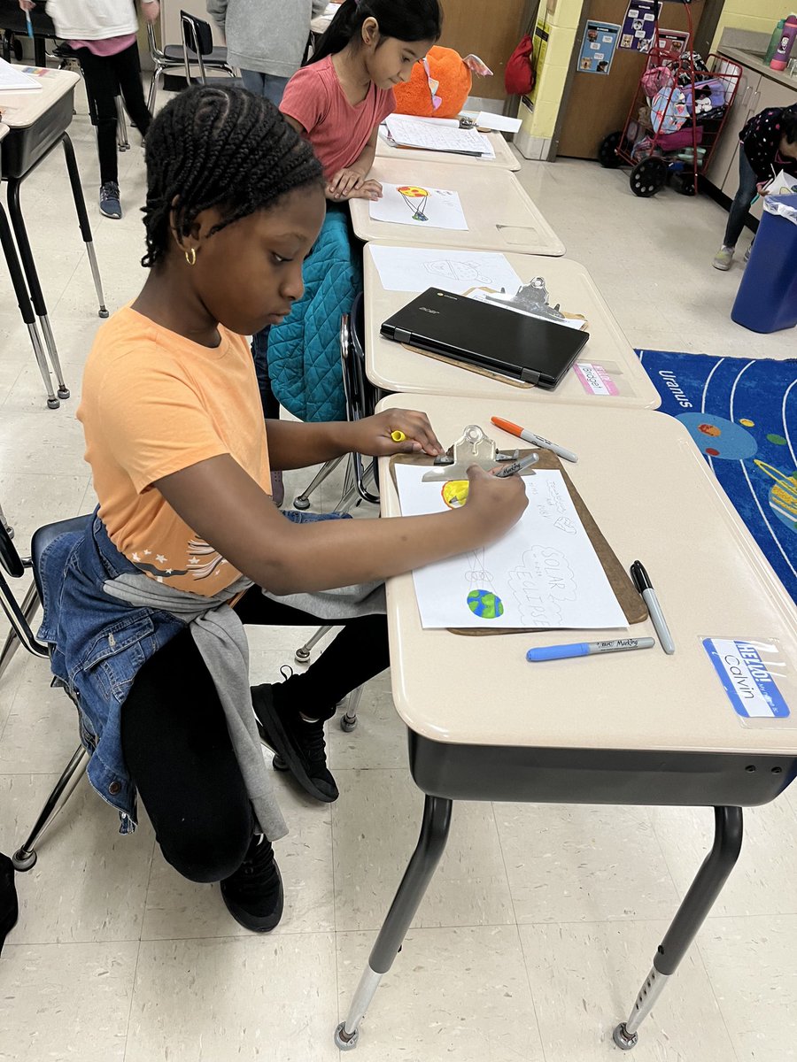 Mrs. Paluch’s drawing club drew a solar eclipse to celebrate the scientific phenomenon. #d123