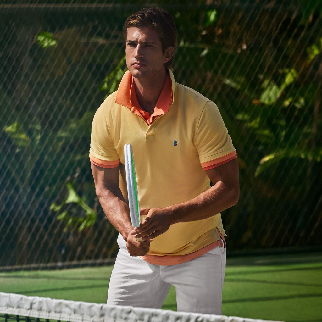 Game, set, match. 🎾 Serving up style with IZOD Advantage Performance shirt.