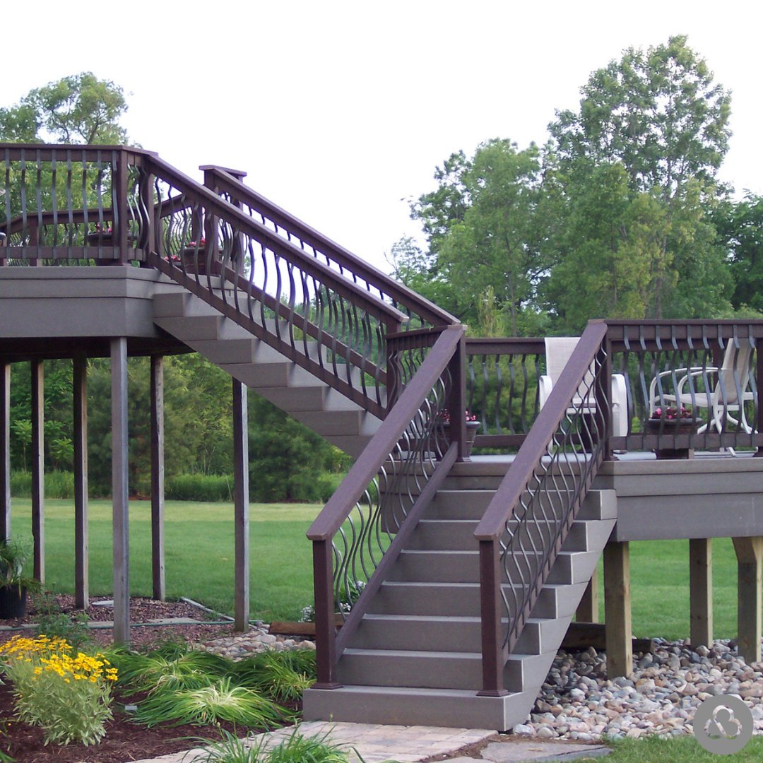 One of the ways to maximize your deck space is to create a two-tiered composite deck. With seamlessly integrated stairs that include a cozy seating area on the landing, every inch of this space is crafted for comfort and style.

#DeckDesign #DeckBuilding #CustomBuiltMI
