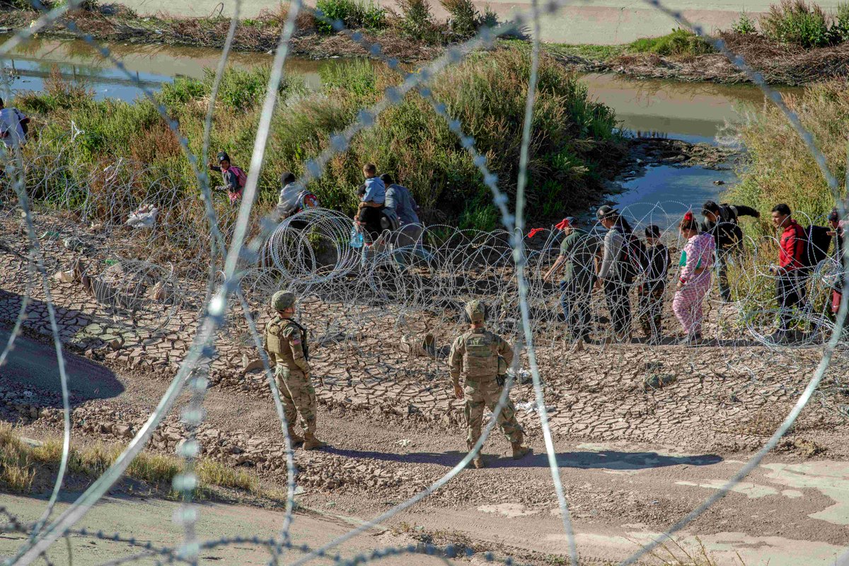 EL PASO, Texas -- Texas National Guard Soldiers deters a group of migrants from crossing into Texas illegally from Mexico. #OperationLoneStar