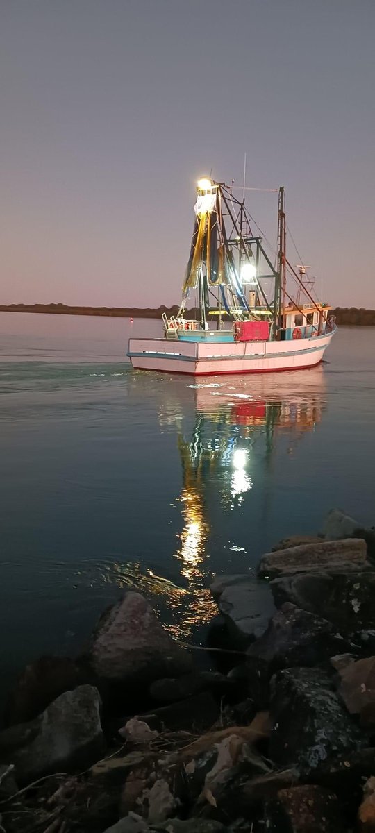 Northern Rivers Photography . Trawler going out to sea Ballina.