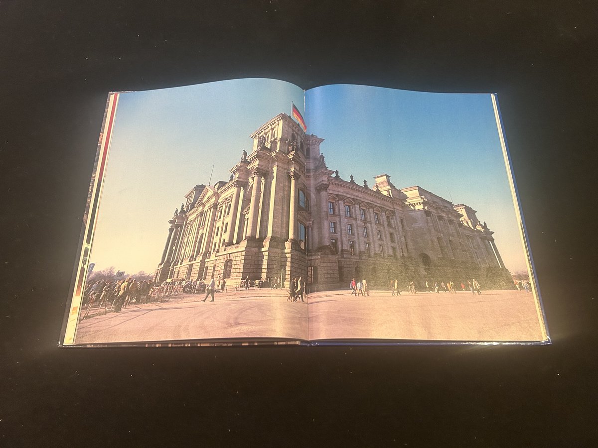 The German government returned to a unified Berlin today in 1999.  I had a chance to see the Reichstag shortly after the Wall came down.  This is a guidebook view from my visit.  #Berlin #ColdWar #DieMauer