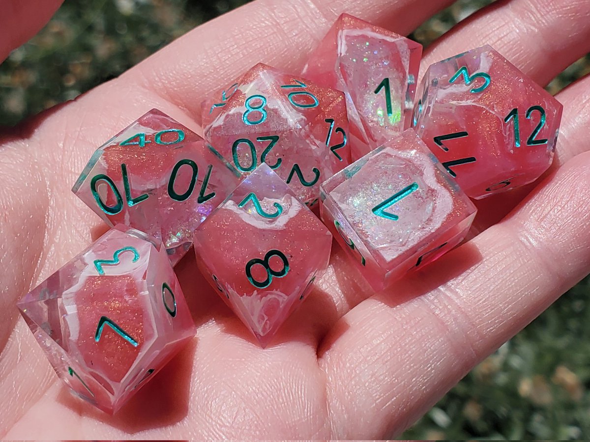 GeekMeUp_Scotty's tweet photo. Swirled pink and white geodes with a sparkly,  holographic core. 

#dnd #dungeonsanddragons #dice #ttrpg #handmadedice #sharpedgedice #geodedice https://t.co/BA552sxwkb