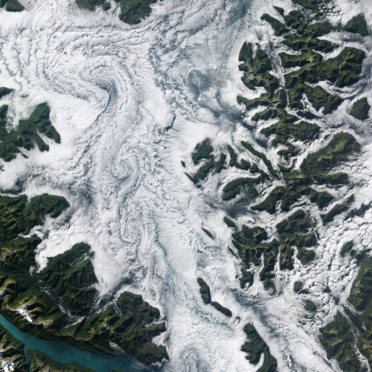 Earth Day countdown: North America The only thing better than clouds outlining craggy topography? When vortexes form too. The fjords of Alaska’s western coast are spectacular in their own right, but we think a bit of cloud cover adds to the drama.