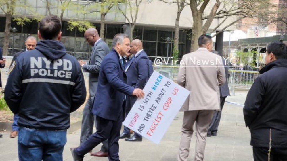 @CollinRugg People are going to try and paint Max Azzarello as either a Trump or Biden supporter and truth is he was neither. @ViralNewsNYC took this photo where you can see the sign Max was carrying. He was against both candidates.