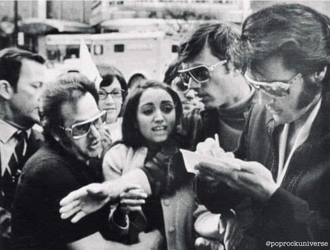 Elvis signs an autograph for a 12-year-old fan . . . 

Named Madonna.