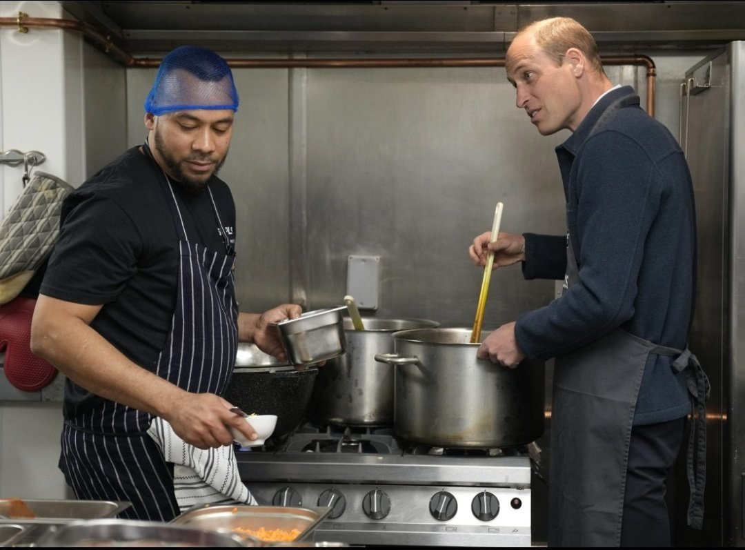 Twitter (X) find me this man! This look reads..'Bruh, Why TF are u here?'  but I would love to hear exactly what he was thinking watching this clown pose for PR pictures while pretending to work in his kitchen!! #PrinceWilliam