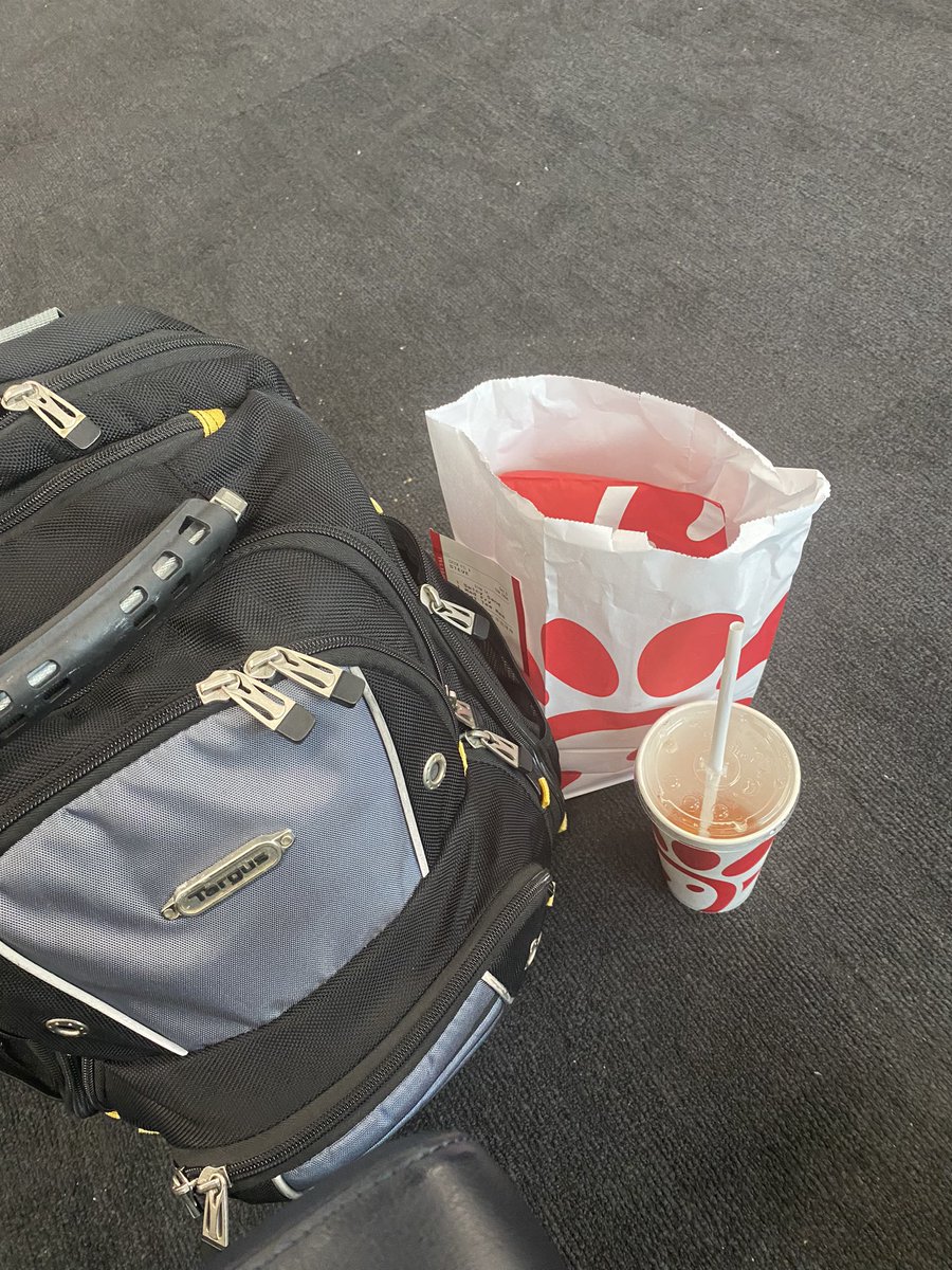 My airplane travel mode. 1. Backpack ✅ 2. Chick-fil-A in the airport ✅ 3. @rhoback long sleeve tee and cap ✅