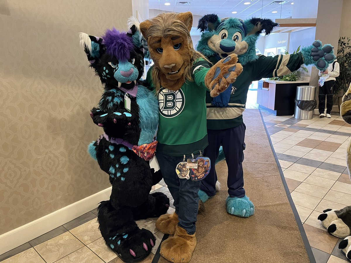 Cat time this #FursuitFriday! This photo was taken at last week’s @Furcationland and features @NexusFolf, @lionwrestlerjun, and one of my roomies for the con, Cyan Glaciertooth! (aka @PaWS_Arts)