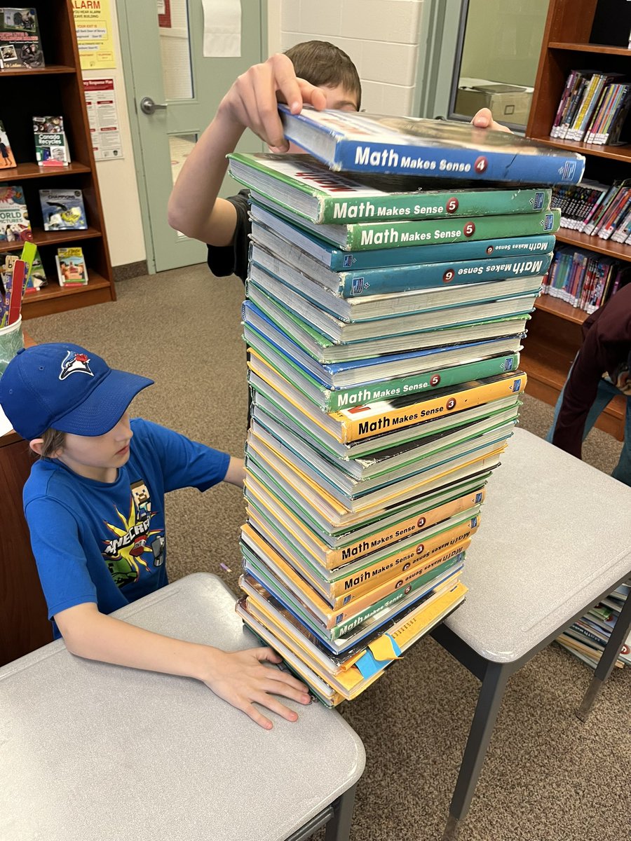 Mrs Puddington’s gr 5 students tested the strength and stability of their truss bridges.  The strongest of the bridges successfully held 41 textbooks without breaking! 💙💛#scienceinaction #handsonlearning