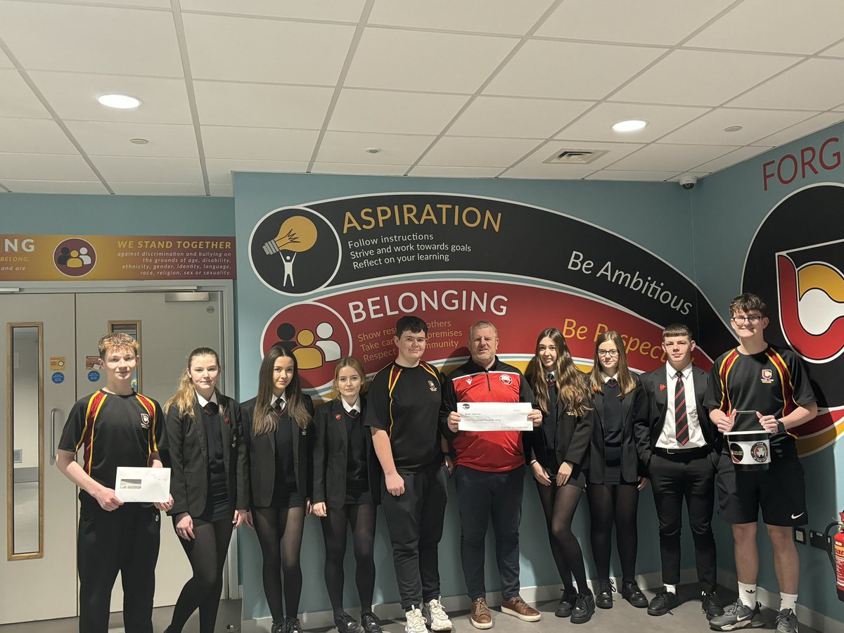 YCB_GivingClub's tweet photo. A huge well done to year 11 Prefects, along with some others who have sold raffles raising a fab £400 for @YnysHwb. The senior team presented Martyn with the money. Along with £50 Billy raised in his bowls team. We look fwd to raising lots more #MentalHealthSupport #fundraising https://t.co/thW054Hjkr