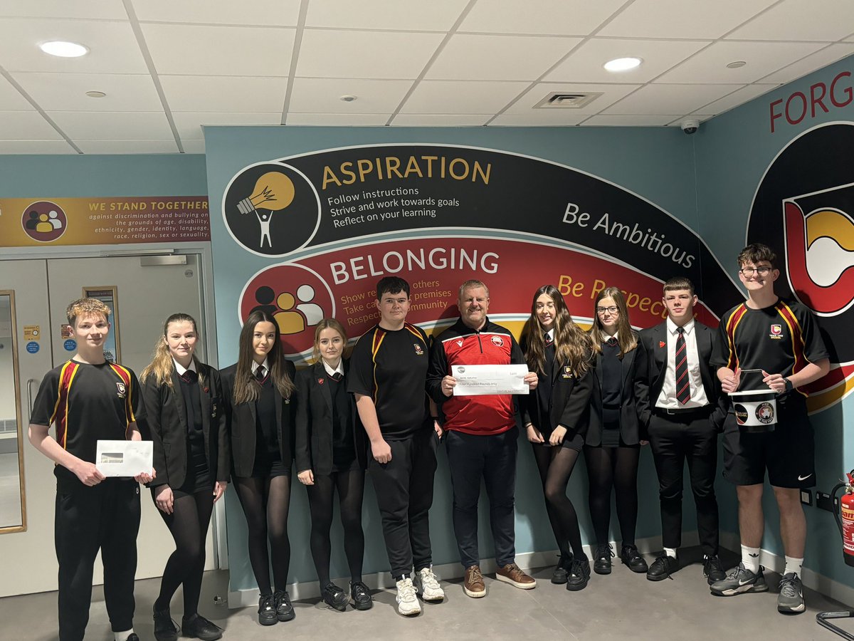 YCB_GivingClub's tweet photo. A huge well done to year 11 Prefects, along with some others who have sold raffles raising a fab £400 for @YnysHwb. The senior team presented Martyn with the money. Along with £50 Billy raised in his bowls team. We look fwd to raising lots more #MentalHealthSupport #fundraising https://t.co/thW054Hjkr