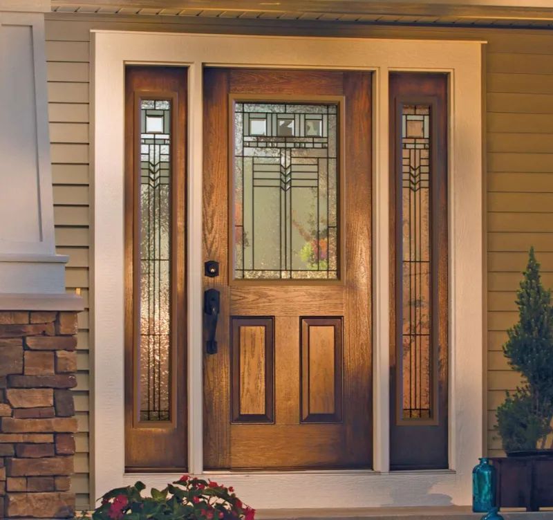 Looking to make a grand entrance? Check out these 25 inviting entry #doordesign ideas for inspiration! From classic to contemporary, find the perfect style #door to welcome you #home. buff.ly/442jLMV #FeatureFriday #EntryDoorDesigns