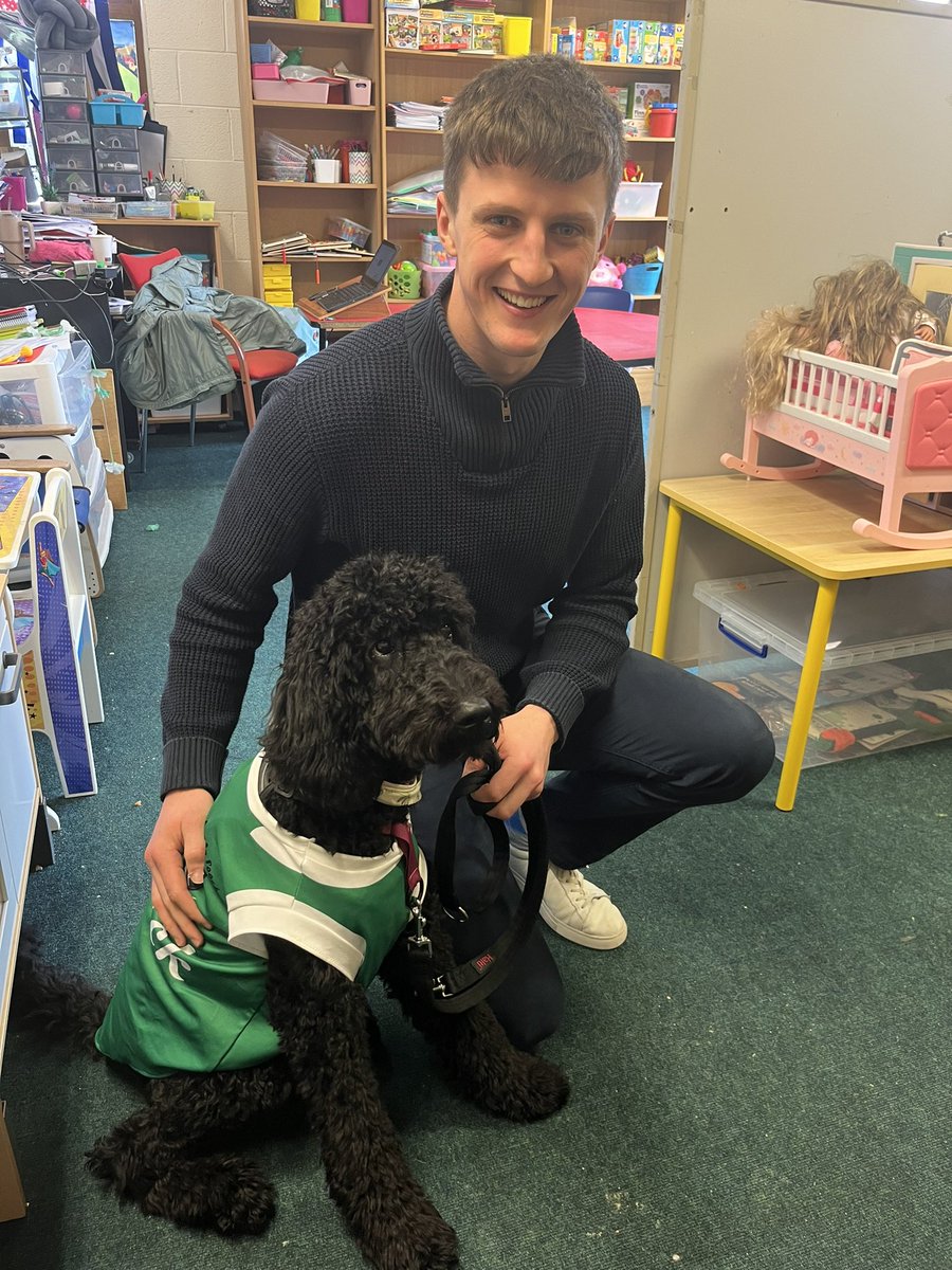 CMoyross's tweet photo. Even Uni, our @mycaninecompani school therapy dog in training, got in on the action, giving a warm pawshake to Mr. Ryan, the brave Clare player who dared to step into the lion's den! 🐾🐾#LimerickVsClare #DoggedDiplomacy 🟢⚪️@DiarmuidRyan4 https://t.co/eaVRKJ3aS7