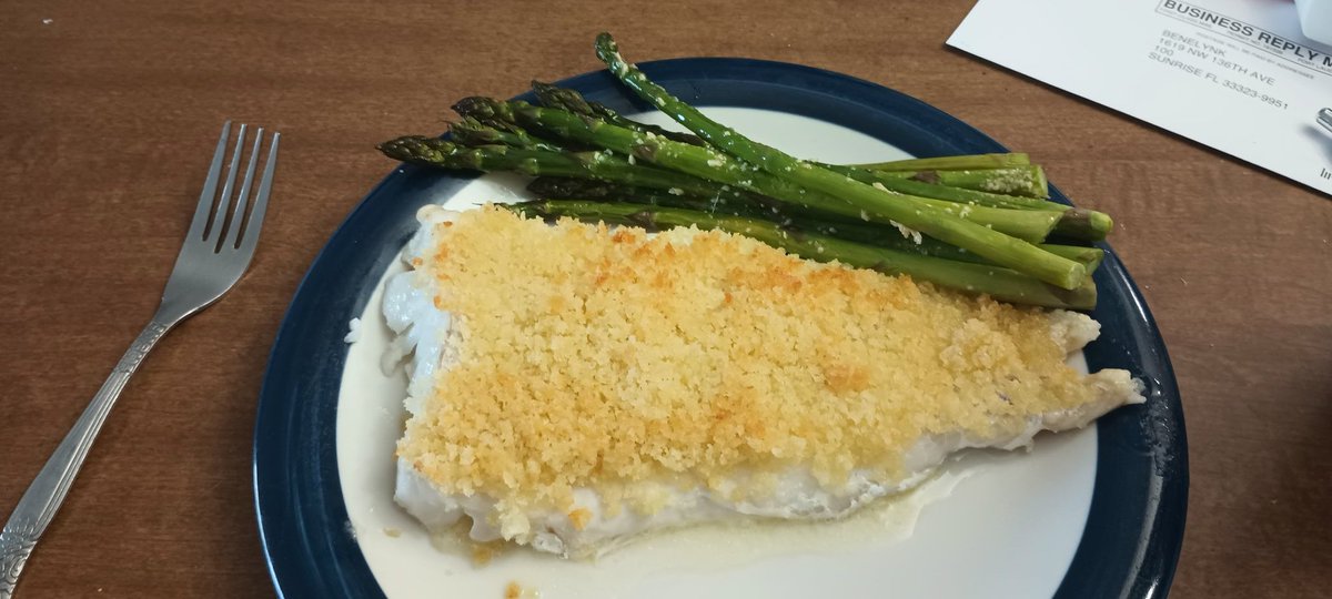 Tonight's supper. Baked fish with a butter, wine and panko crust, asparagus in olive oil, garlic and grated Parmesan cheese.