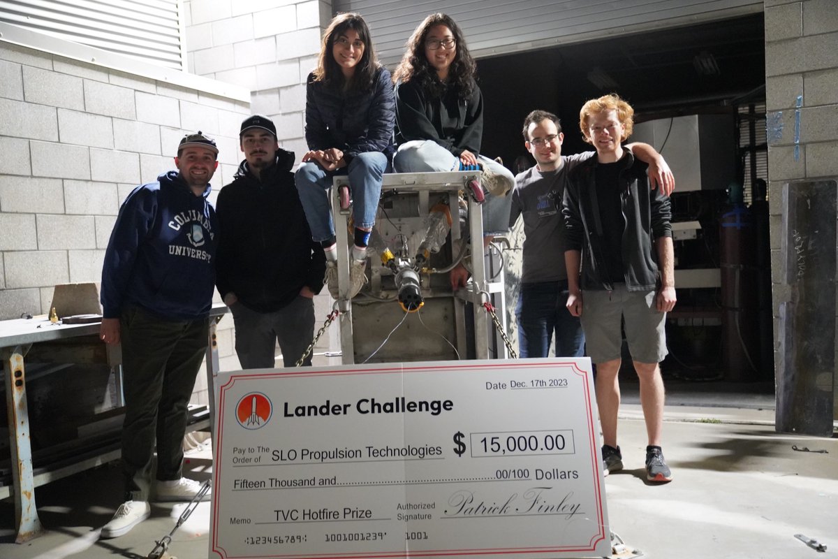 SPT from <a href="/CalPoly/">Cal Poly</a> with their giant check, for winning the $15k TVC Milestone a few months back!