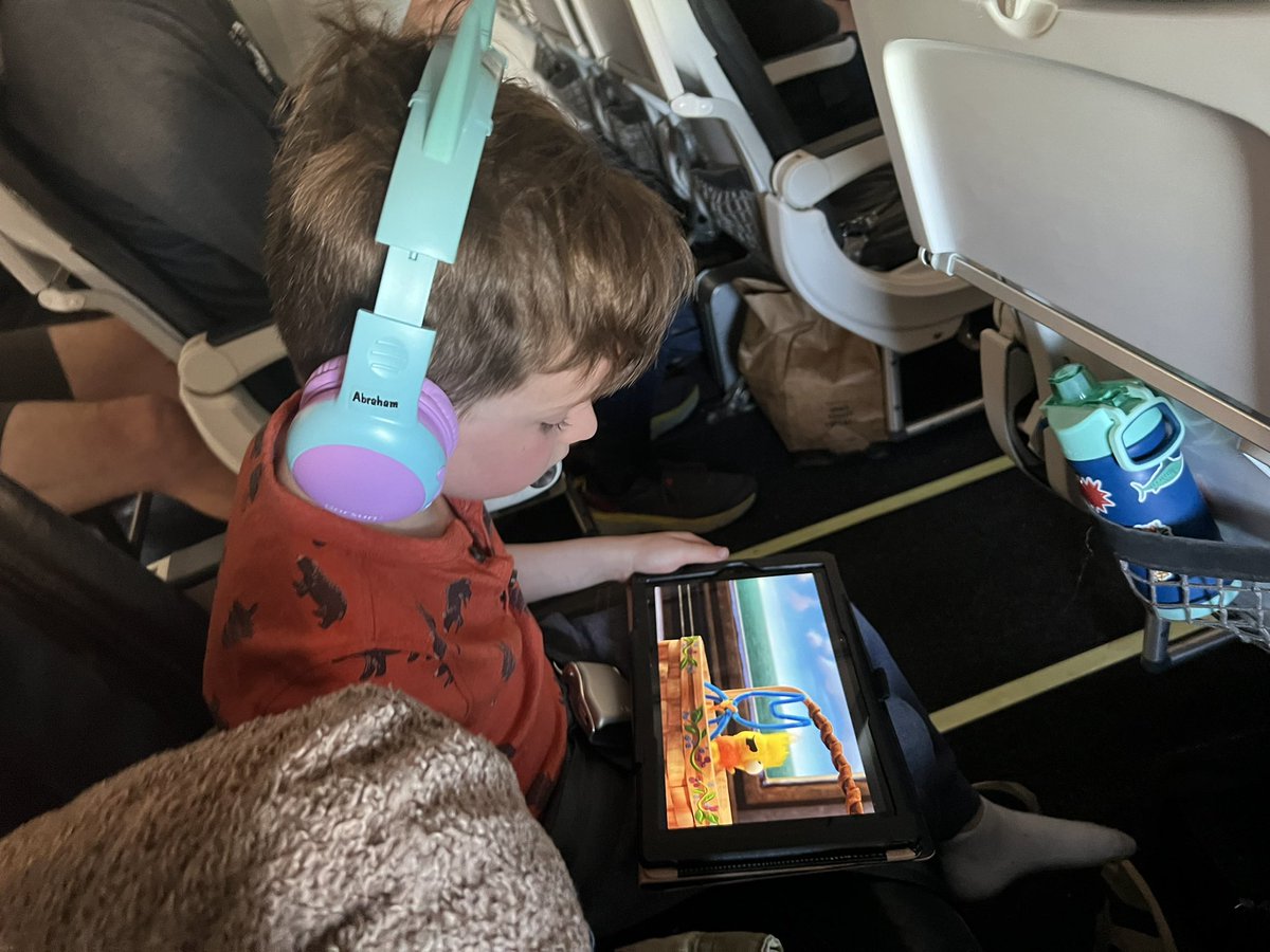I HAVE DONE IT. I HAVE CROSSED THE THRESHOLD IN WHICH BOTH MY CHILDREN WILL WATCH TV ON A PLANE. AND IM NEVER GOING BACK!! I, TOO, WATCHED TV. WHAT IS THIS NEW WORLD?!?!