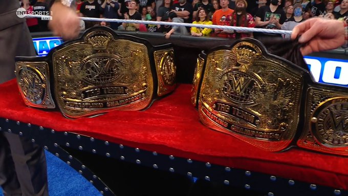 Which titles do you prefer: the World Tag Team Championship belts OR the WWE Tag Team Championship belts? #WWERaw #SmackDown
