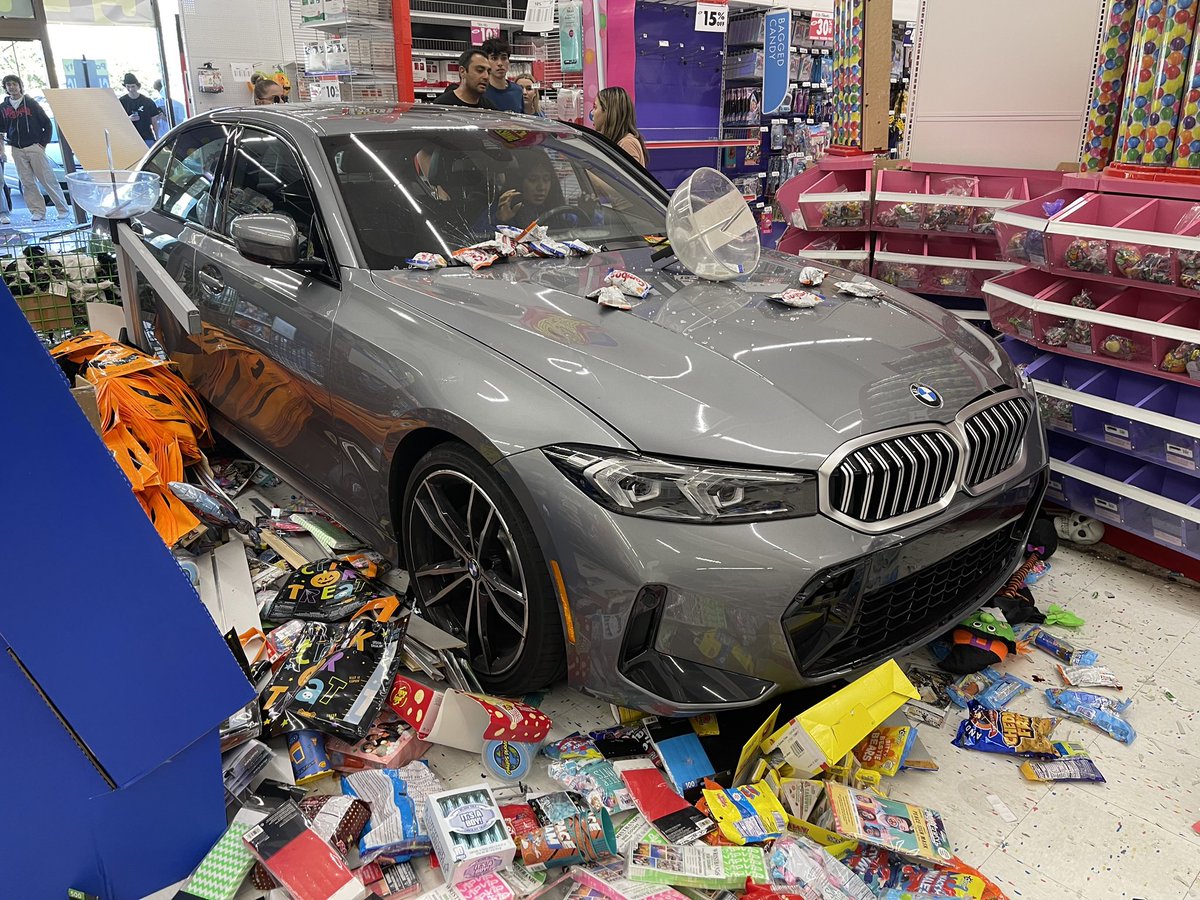 GirlLeast's tweet photo. Hey @OC_Scanner so this just happened at Party City in Orange. Car drove through the front. https://t.co/T6dYJgFsi1