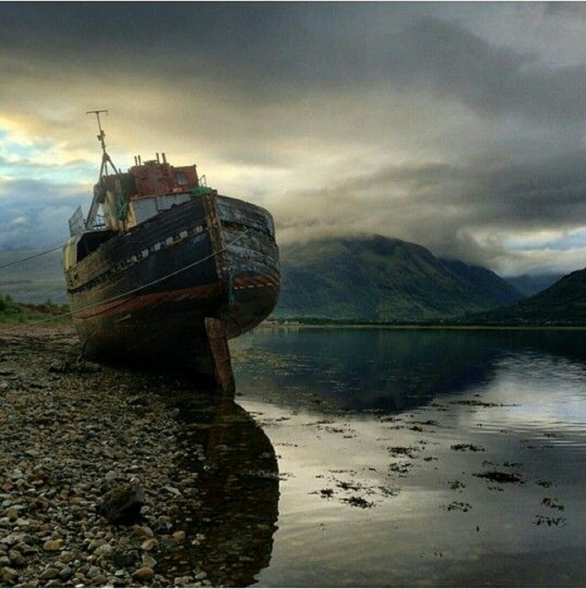Boat on the rocks of Loch Linnhe, Scotland. NMP.