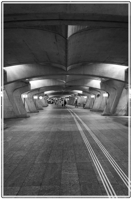 #Zurich #Stadelhofen #station is near to the lake and serves the #city and its #region. It also has many #smallbusinesses and larger #retailers which allow #commuters to buy #groceries and other #goods. #blackandwhitephotography #blackandwhite #photography. #streetphotography