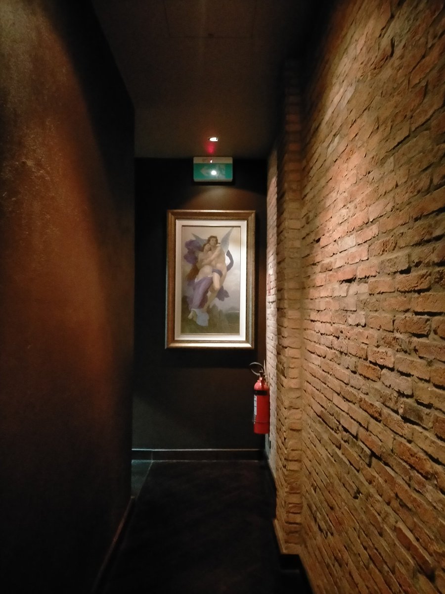 Anntics's tweet photo. La Cantina in Narrabundah, Canberra,  showing brick wall feature and replica Italian oil painting. Photos taken with permission of staff. https://t.co/Rkxml755vo