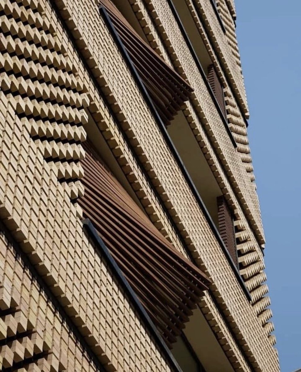 Unique use of brick and tiles in this residential building in Dazful, Iran. By bio-design architects