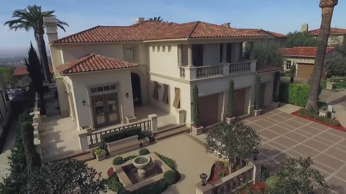 Intruder who stormed $7M mansion in ultra-posh Newport Beach gated community with accomplice who was shot dead by homeowner, is charged with felonies - as it's revealed they had guns, zip ties and rope trib.al/IS7ltwO