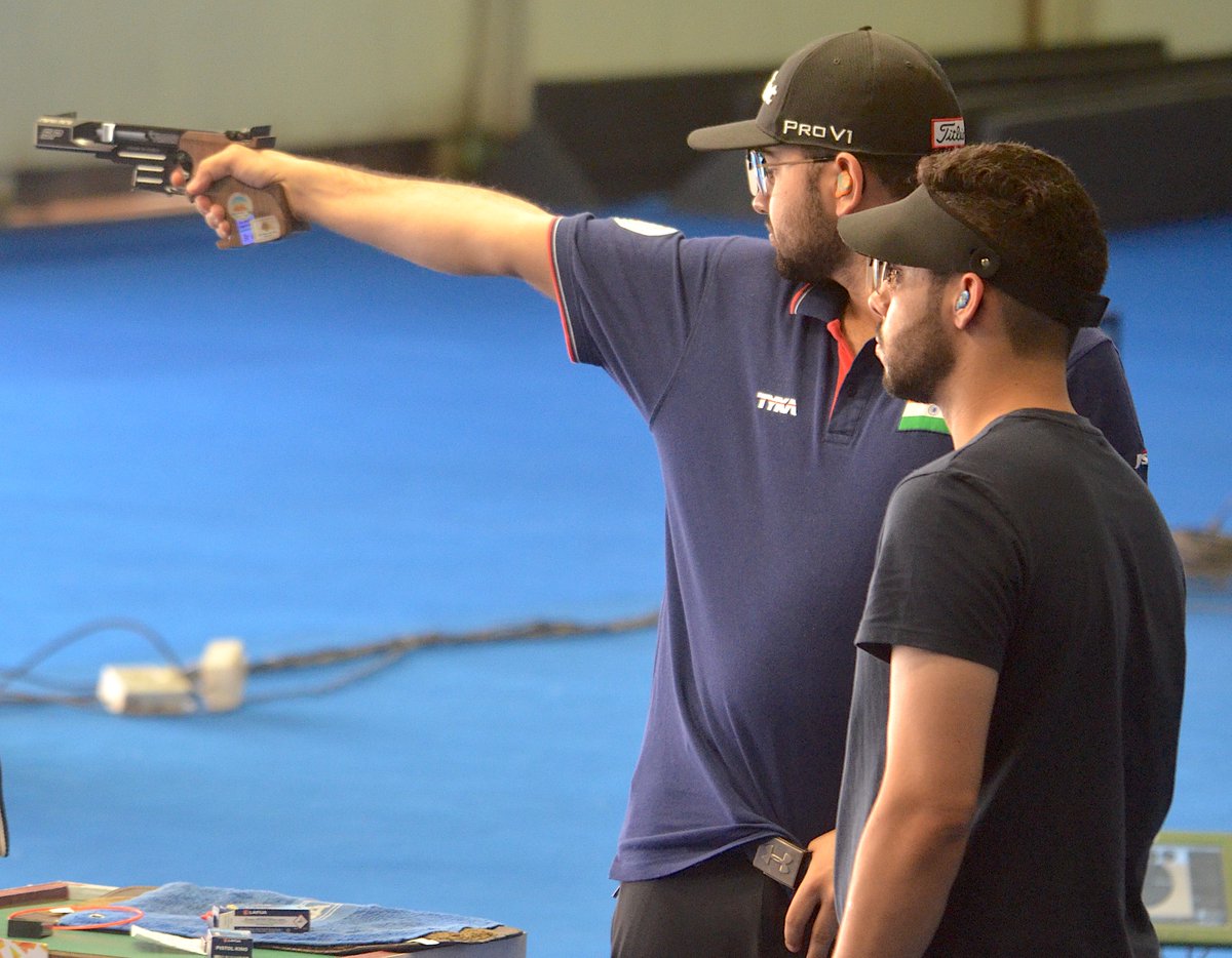 Anish Bhanwala takes aim while Vijayveer Sidhu focusses inwards during the men's 25m Rapid Fire Pistol final at the Olympic Trials 1 in the Dr. Karni Singh Shooting Ranges on Saturday. Anish topped the final with 33 hits (off 40) while Vijayveer was second with 27.