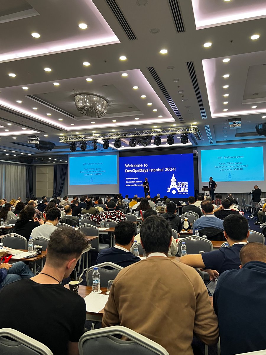 devopsdaysist's tweet image. DevOpsDays Istanbul 2024 has started and it&apos;s going strong with amazing energy! Our opening speaker, @srhtcn is giving us incredible insights about the event. We&apos;re excited to inform our attendees! 💡#DevOpsDays #DevOpsDaysIstanbul2024