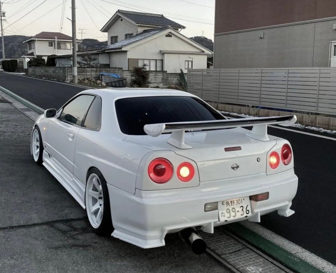 All white Nissan GTR-R34 Skyline