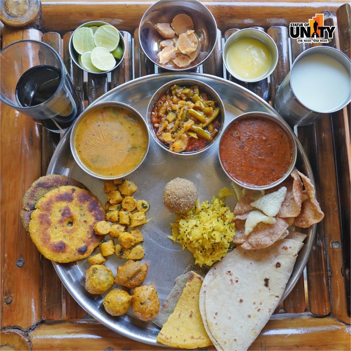 souindia's tweet photo. Awaken your senses with the flavors of unity by trying the #EktaThali, at #EktaNursery.

Indulge in a culinary journey celebrating the rich diversity of Gujarati cuisine. From savory delights to sweet surprises, every bite tells a story of togetherness! 

#UnityInFlavors #StatueOfUnity #UnityInFoodDiversity

@udit_ias @MukeshPuri26