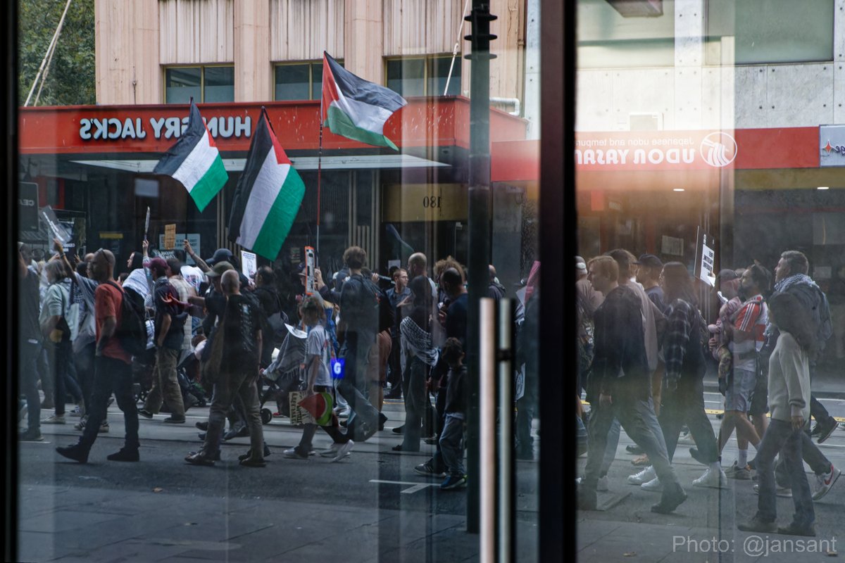 #CeasefireNOW rally in Naarm (Melbourne) mirrored on a storefront window.
#auspol #springst