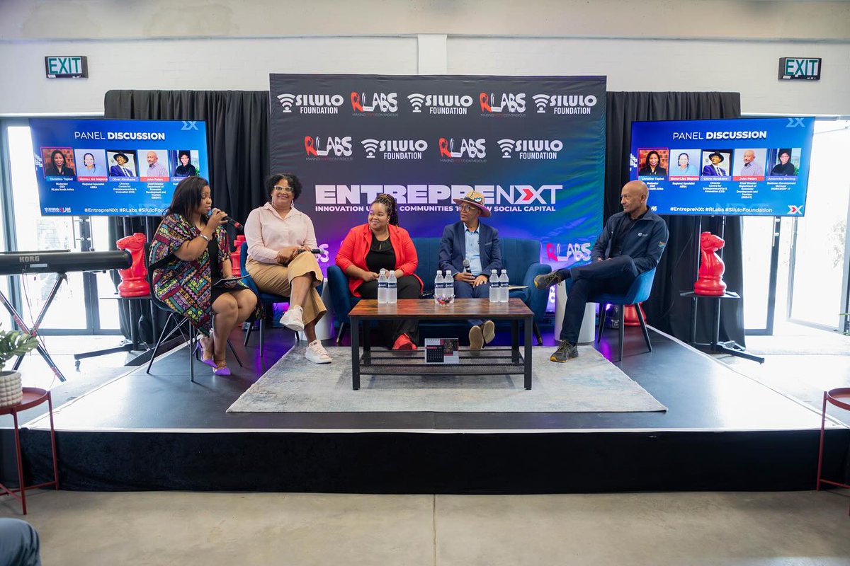 RLabs's tweet image. On stage, we have Ms. Mona-Lisa Maphosa of ABSA, Mr. Abraham Oliver of UWC, Mr. John Peters of DEDAT, and Ms. Antonette Benting of Workshop17, discussing the realities of community building.

#RLabs #SiluloFoundation #EntrepreNXT #RLabs2024