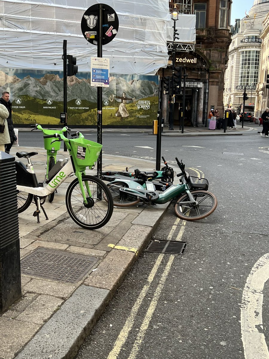 VoteTimBarnes's tweet photo. Corner of Shaftsbury Av and Gt Windmill St this morning in #Soho
This is a narrow road with a history of speeding.
#ebikes left falling in to the road. Just dangerous and awkward for everyone.
#humanforest and @tier_mobility the bikes concerned this time and not @limebike
And, yes, I did stand them up out of the road.
There's just too many bikes for the number of bike pools.