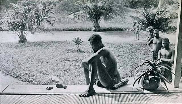 A father stares at the hand and foot of his five-year-old daughter severed as a punishment for failing to make the daily rubber quota, Belgian Congo, 1904. The man’s name was Nsala. He had failed to make his daily rubber quota, so the Belgian-appointed overseers cut off his