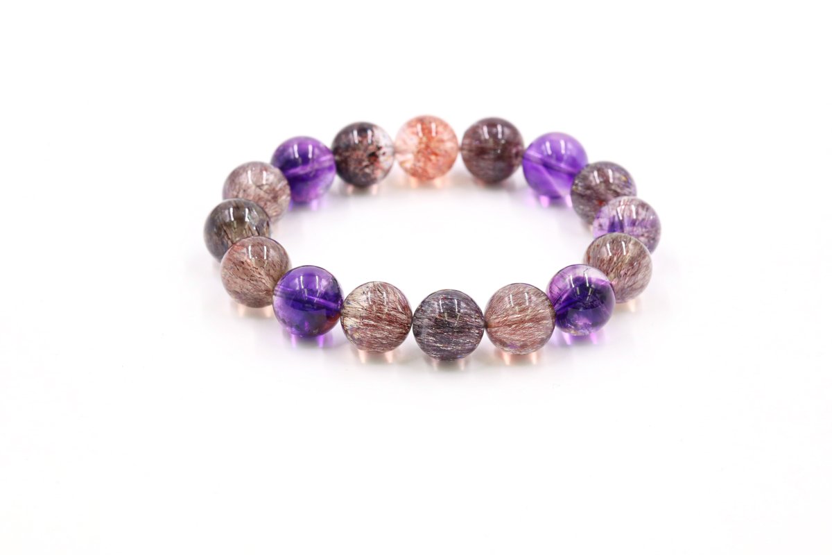 A Super Seven Amethyst bracelet combines the healing properties of seven gemstones, including amethyst, to promote spiritual growth and balance energies, elegantly worn as a wearable talisman for holistic well-being.

#superseven #bracelet #gemstonebracelet #jewelry #925silver