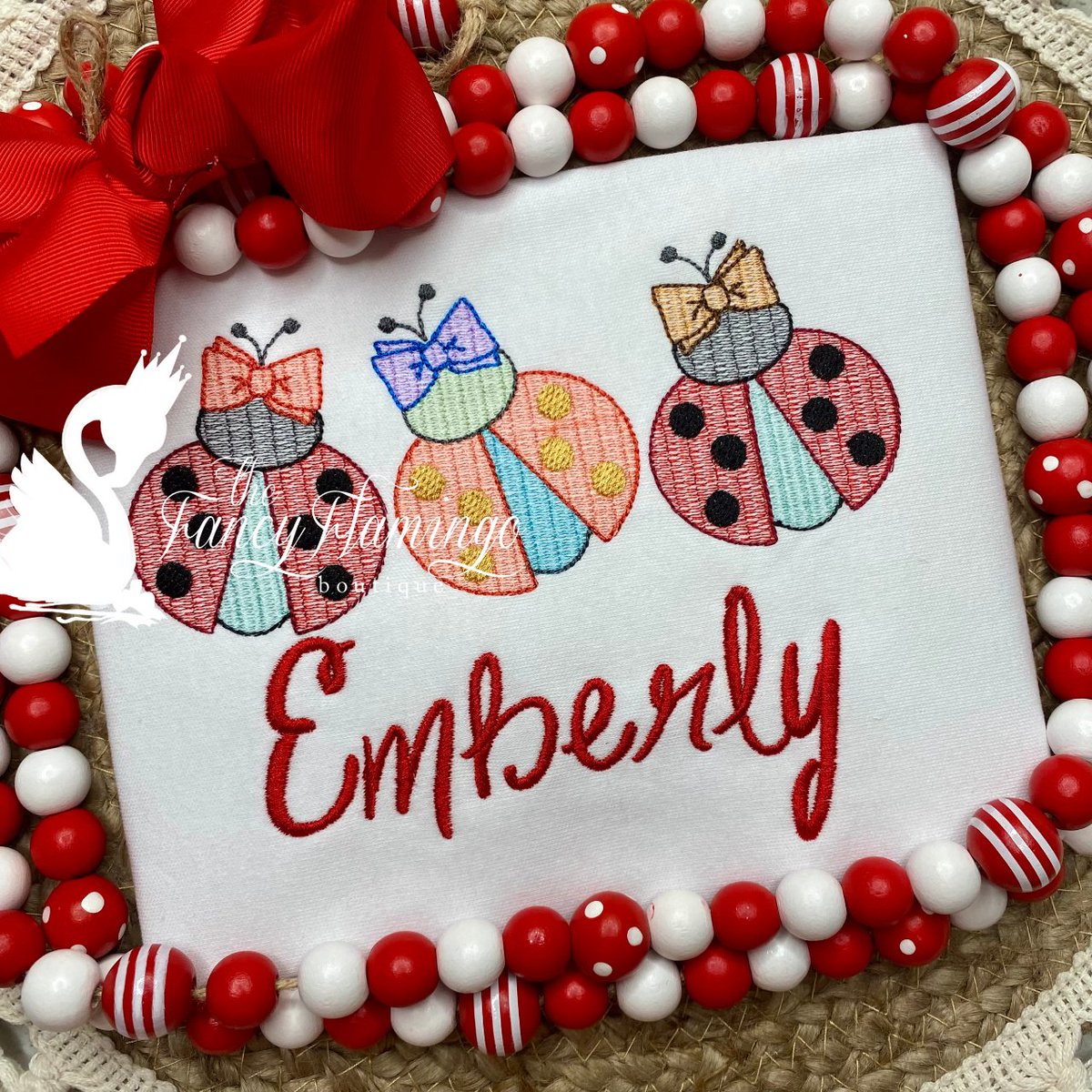 This adorable shirt features a charming ladybug trio with bows, skillfully embroidered to create a personalized sketch just for your little girl.  # #ladybug #ladybugparty #ladybuggirl #machineembroidery #personalizedclothing #personalizedgifts #jacksonvillemoms