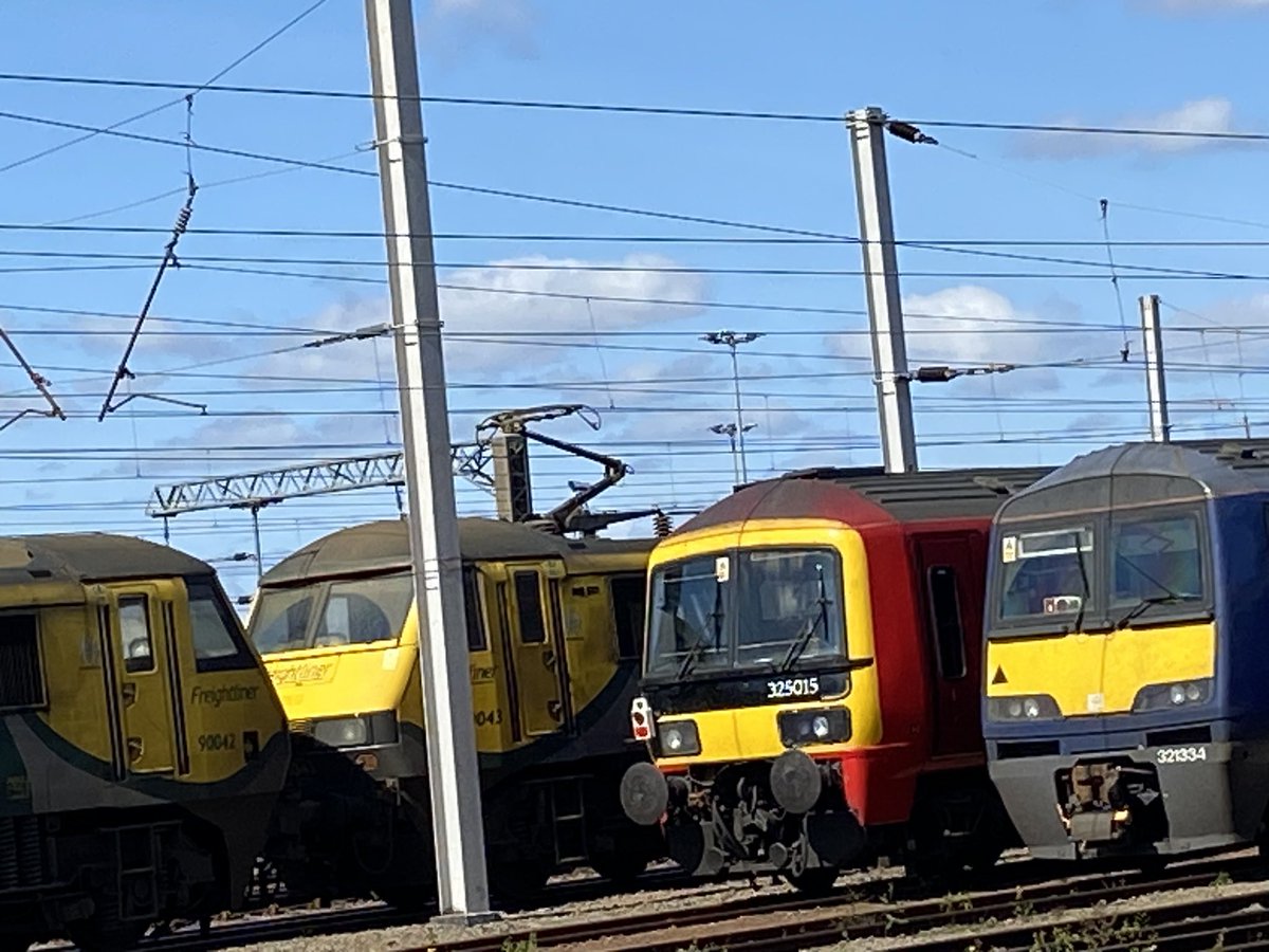 A nice line up of various sets and locomotives at Mossend UY
