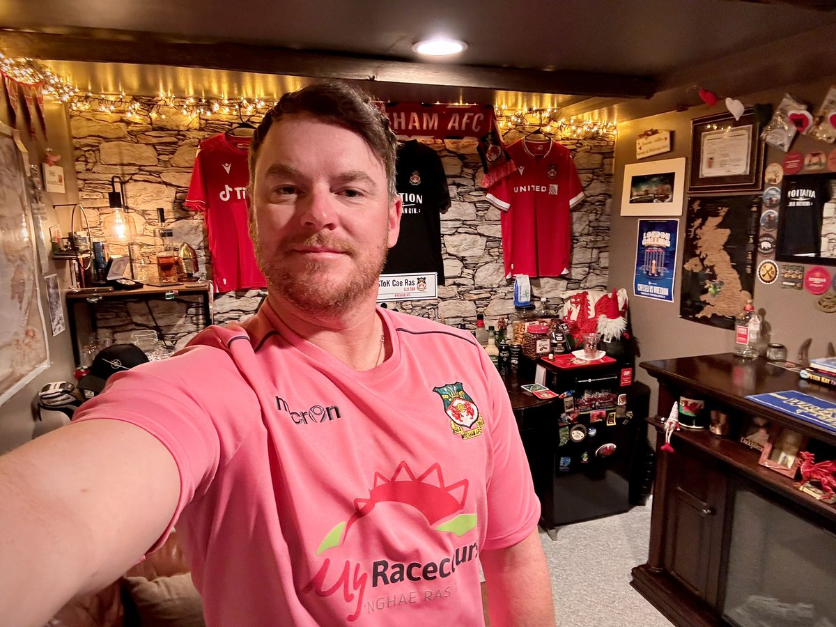 SirThomasJones's tweet photo. Early 7:30am kick off here in Michigan. 
Dug this relic of a shirt out this morning. Let’s put on a show today @Wrexham_AFC  #askwxm keep up the great commentary. 🏴󠁧󠁢󠁷󠁬󠁳󠁿 @m_griffiths92 https://t.co/BzCsCRHqNQ