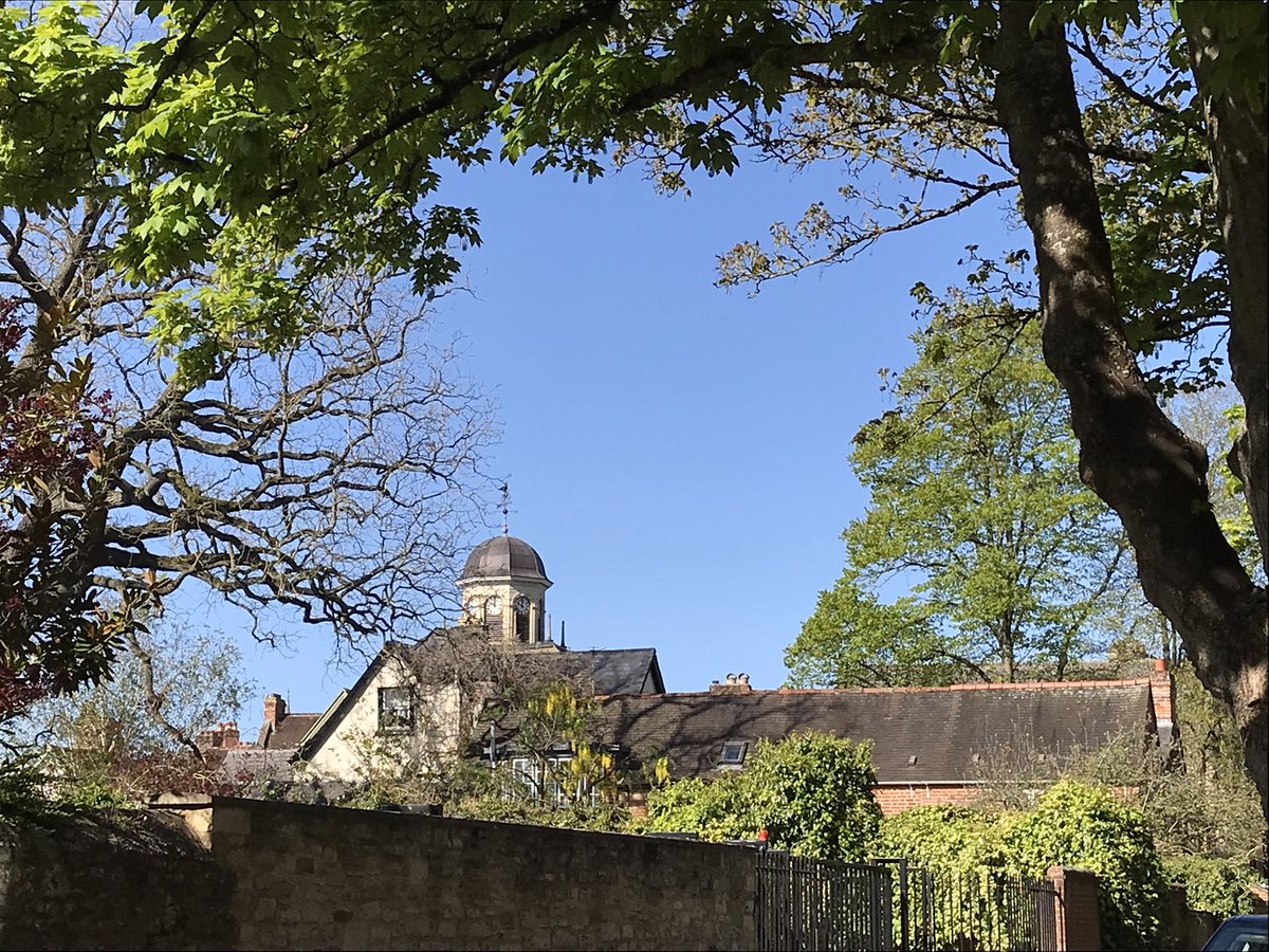 How gorgeous is this?! The @HMCOxford clock tower against a perfect blue sky, viewed from Jowett Walk #Oxford