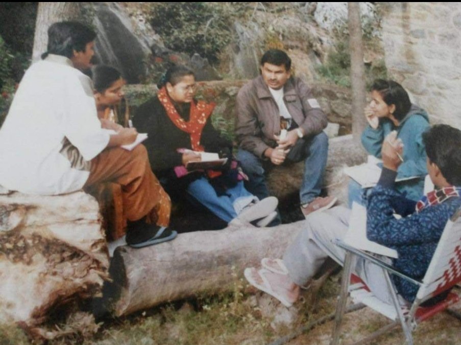Browsed through some albjms today. This is what #Sustainability discussions looked like in the 90s. No conferences, no ac five star hotels. Just a group of us trying to figure out how to #savetheplanet #yourstruly in a green jacket #totallyengrossed