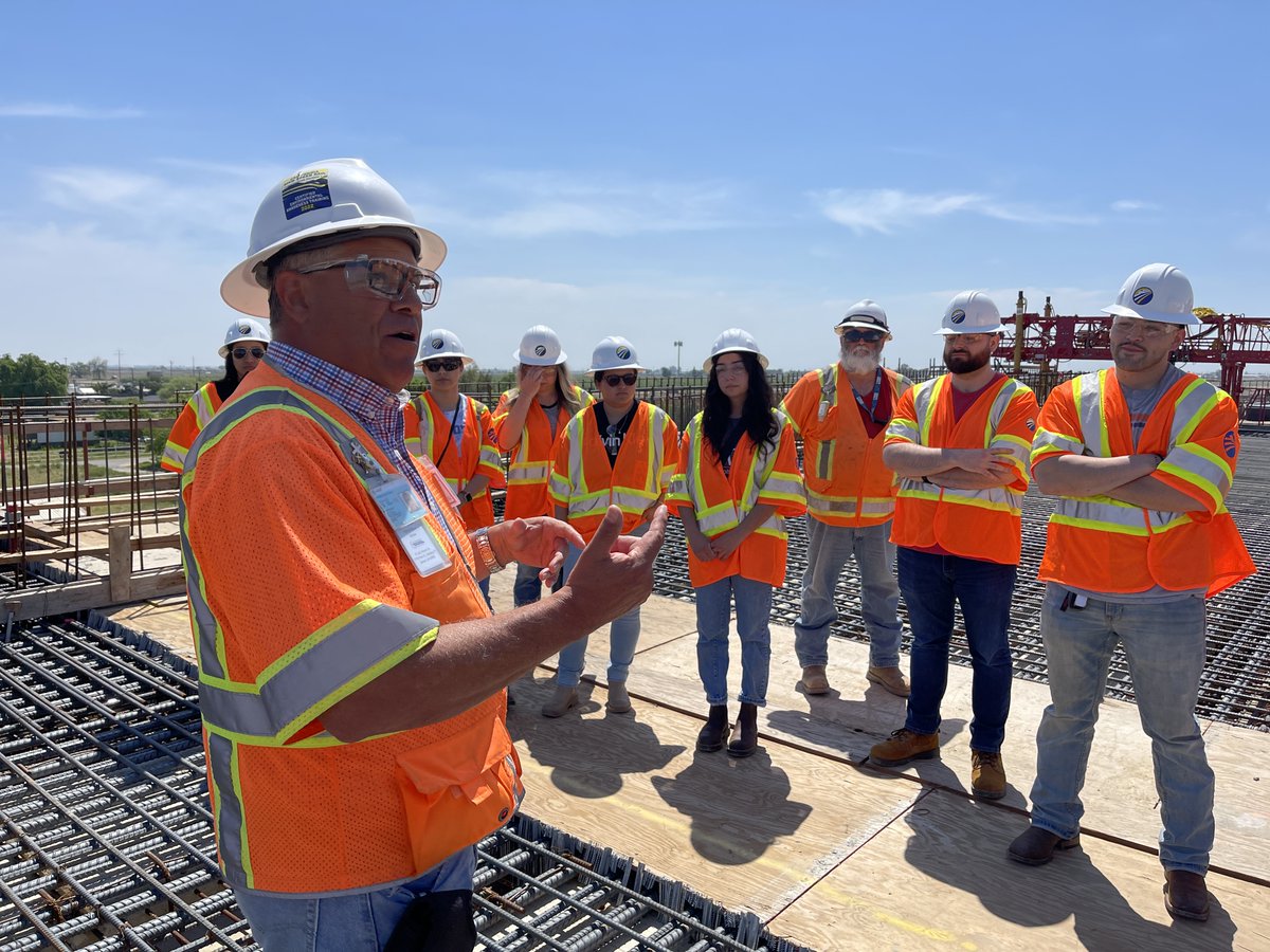 CaHSRA's tweet photo. In collaboration with our long time education partner, Dr. John Green, we took a group of engineering students studying railroad geometry at @Fresno_State to tour construction in the Central Valley! #GoDogs #IWillRide 🚄 🐾 https://t.co/kMkQXD2Hxu