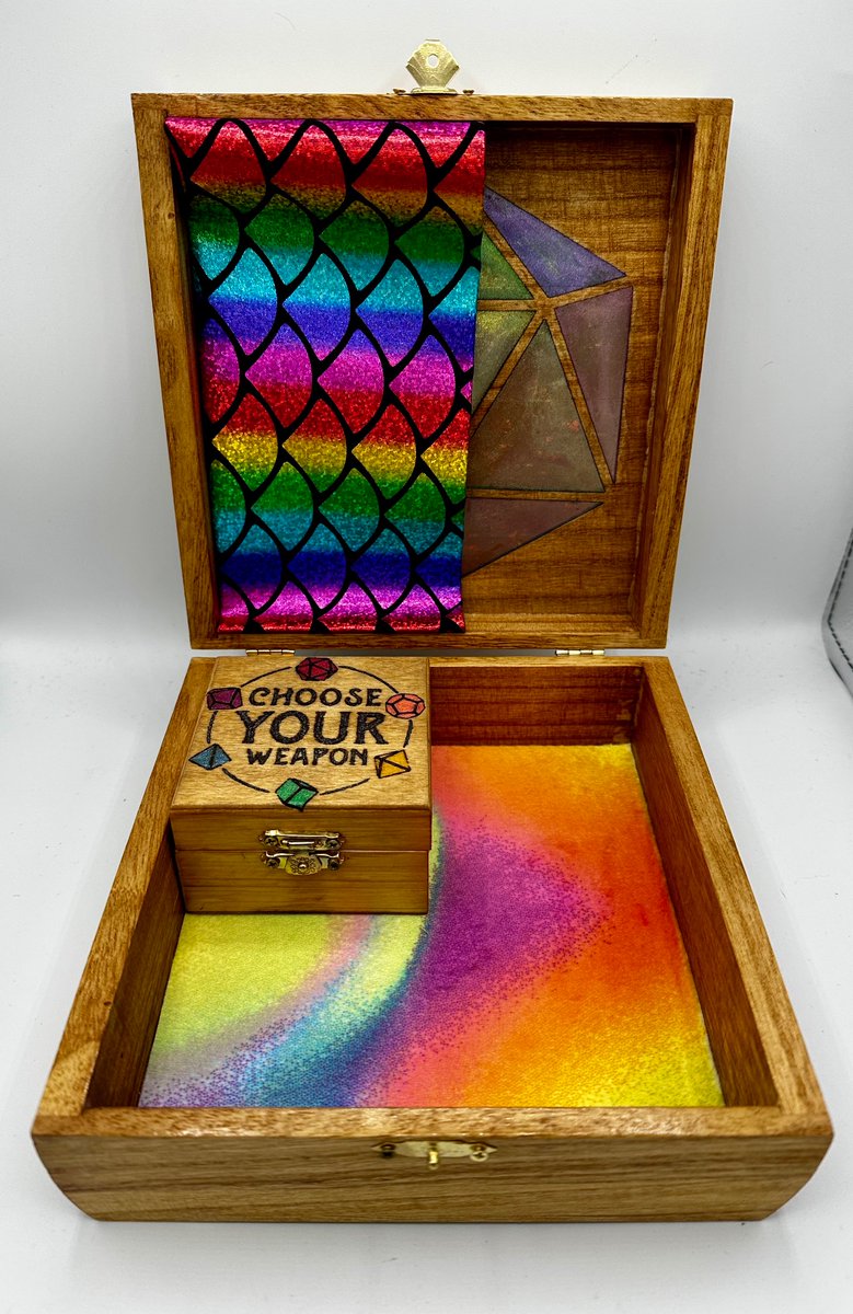 ValkyrieTotems's tweet photo. Show the full spectrum of your storytelling skills with the rainbow  DM dice box!

Snag a smaller dice box for that busy gamer on the go!

Four days until @Calgaryexpo come and say hi at Artist Alley A5712!

#calgaryexpo #dungeonsanddragons #dungeonmaster #pride #dice https://t.co/ZDKdcqUNlI