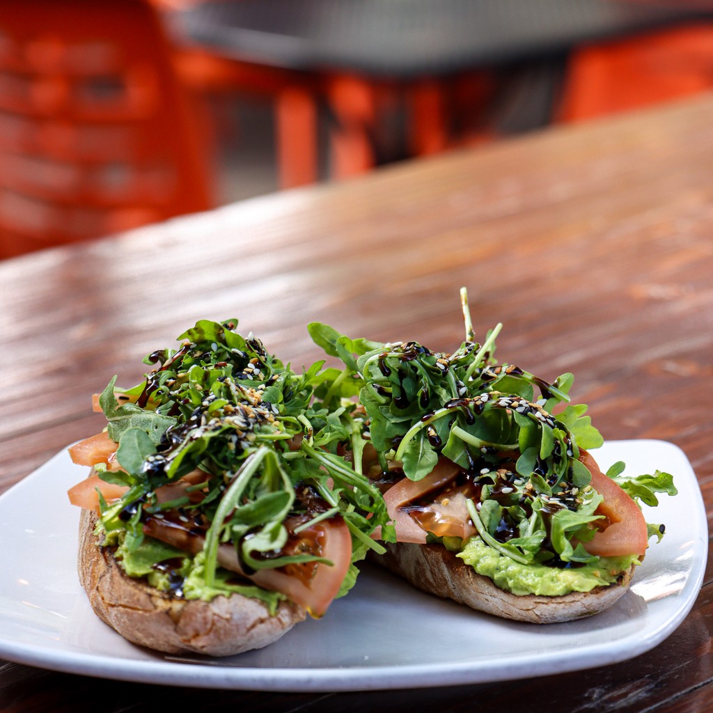 Avo Toast🥑 🍞 The weekend’s perfect food. Our Avocado Toast is available all day! 🧡🖤