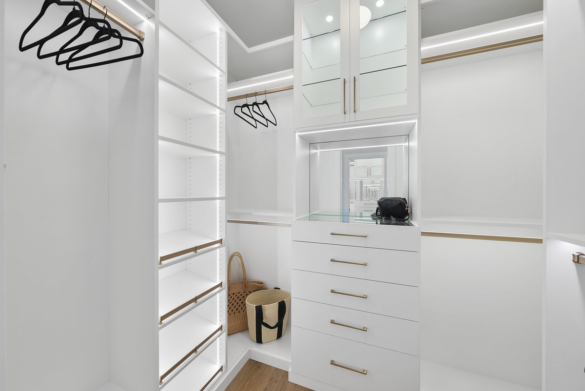 This was an excellent use of space for a smaller closet #closet #design #milliondollarlisting #lighting #homedesign #SmallSpaceDesign #ClosetGoals #InteriorInspo #HomeOrganization #LuxuryLiving #HomeDecorIdeas #ClosetEnvy #DesignInspiration #DreamCloset #HomeStyling