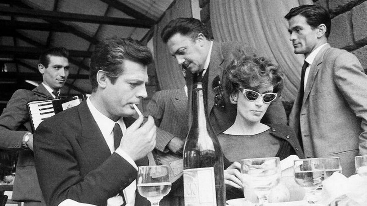 Marcello Mastroianni, Federico Fellini, Anouk Aimée, & Pier Paolo Pasolini during the filming of 'La Dolce Vita' (1960)